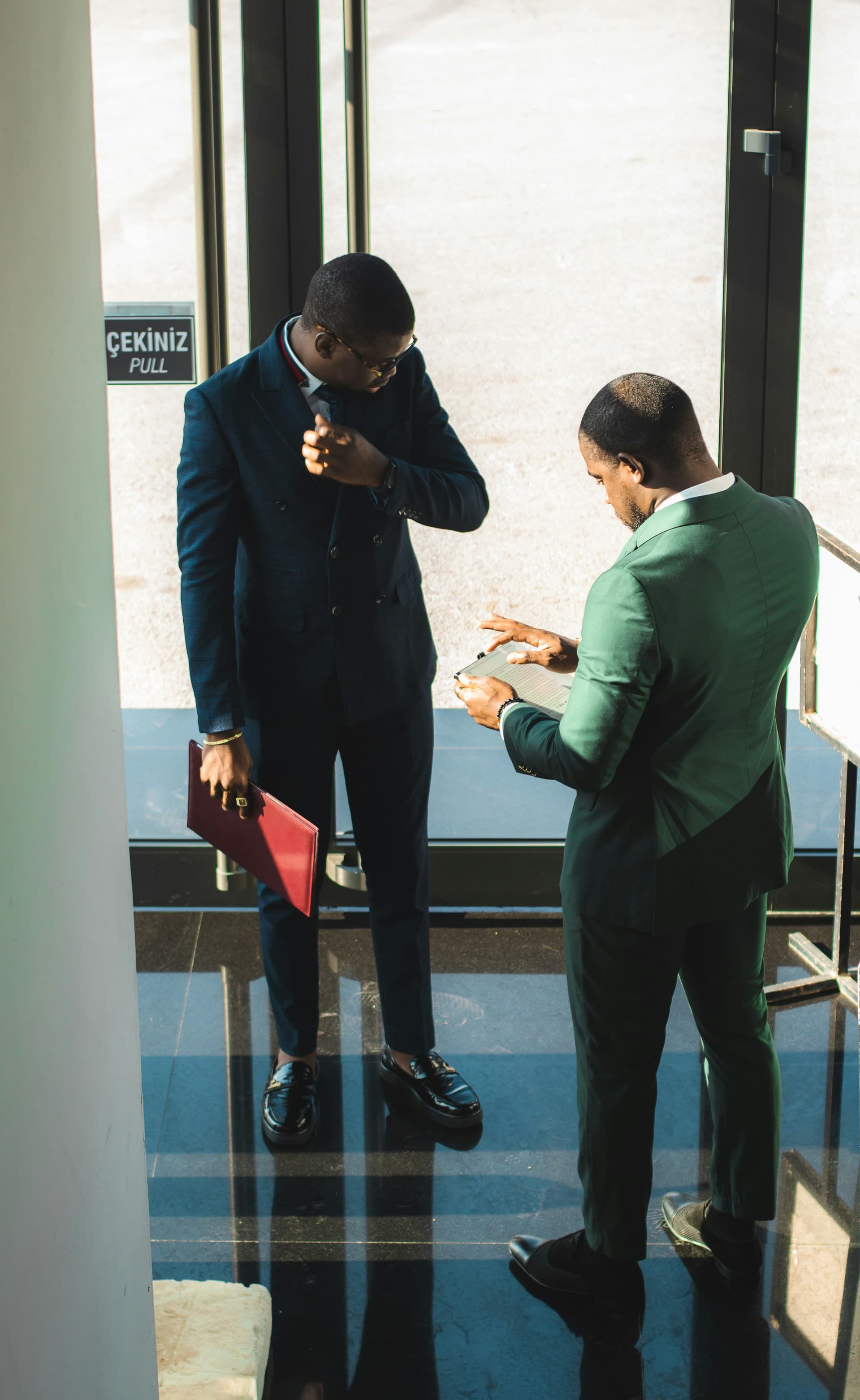 Two men collaborating