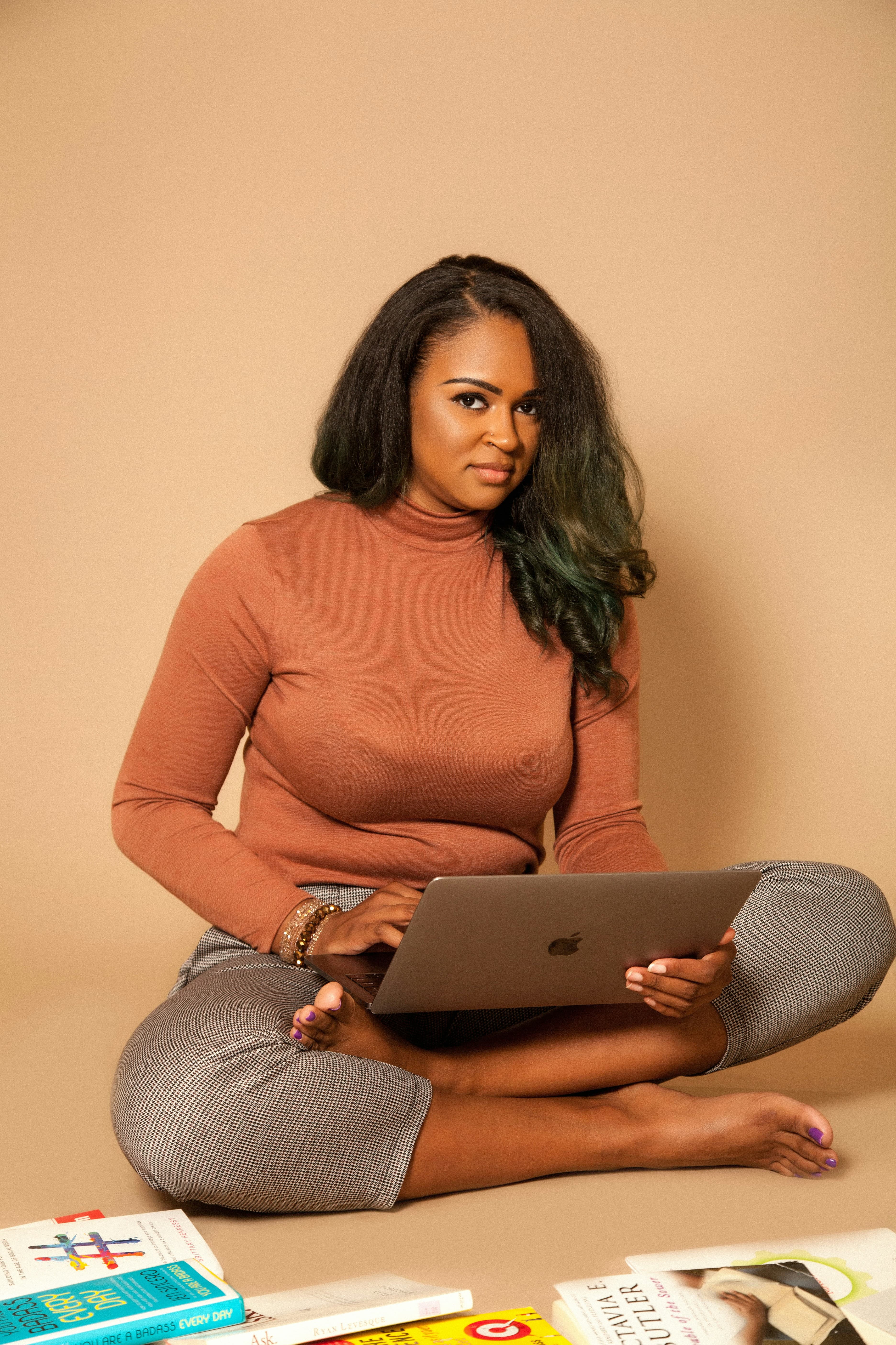 Woman founder working on laptop